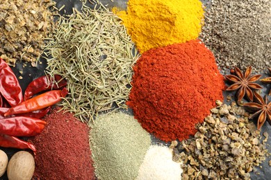 Photo of Many different spices on table, flat lay