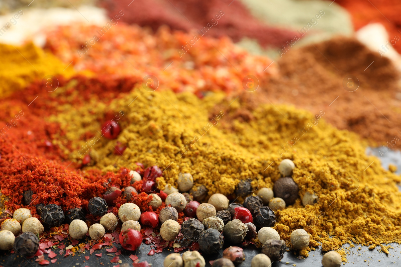 Many different spices on table, closeup view Photo of Many different spices on table, closeup view