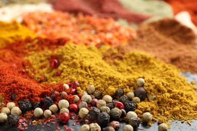 Photo of Many different spices on table, closeup view