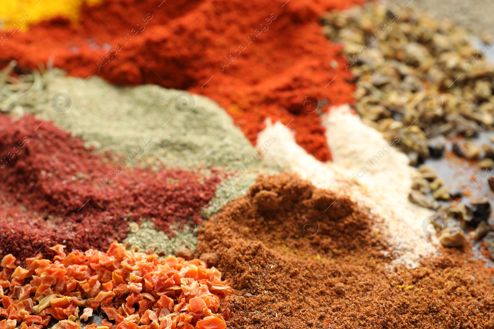Many different spices on table, closeup view Photo of Many different spices on table, closeup view