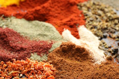 Photo of Many different spices on table, closeup view