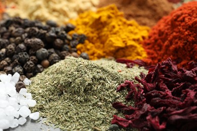 Photo of Many different spices on table, closeup view