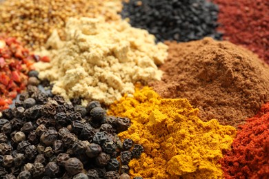 Photo of Many different spices as background, closeup view