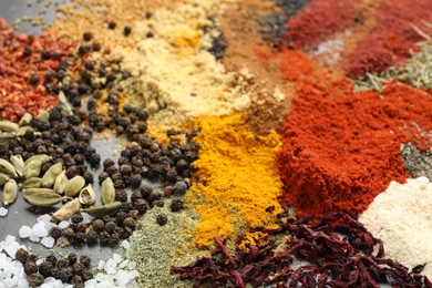 Photo of Many different spices on table, closeup view