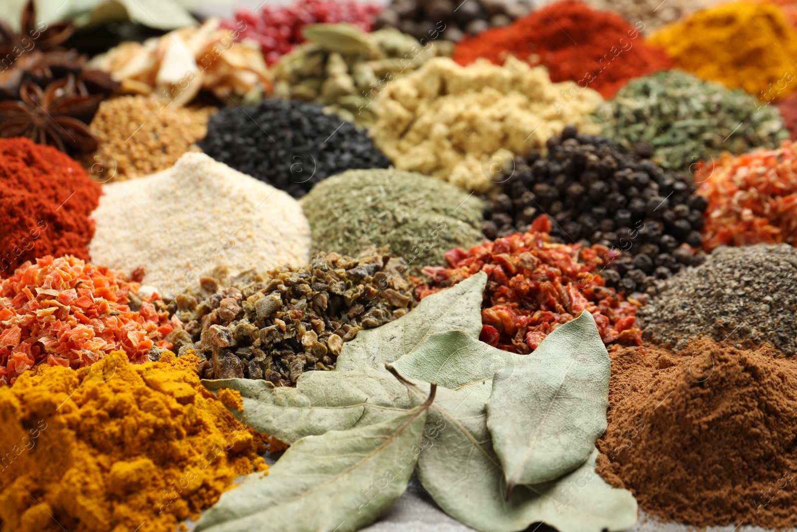 Many different spices as background, closeup view Photo of Many different spices as background, closeup view