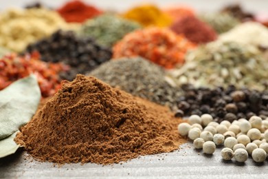 Photo of Many different spices on table, closeup view