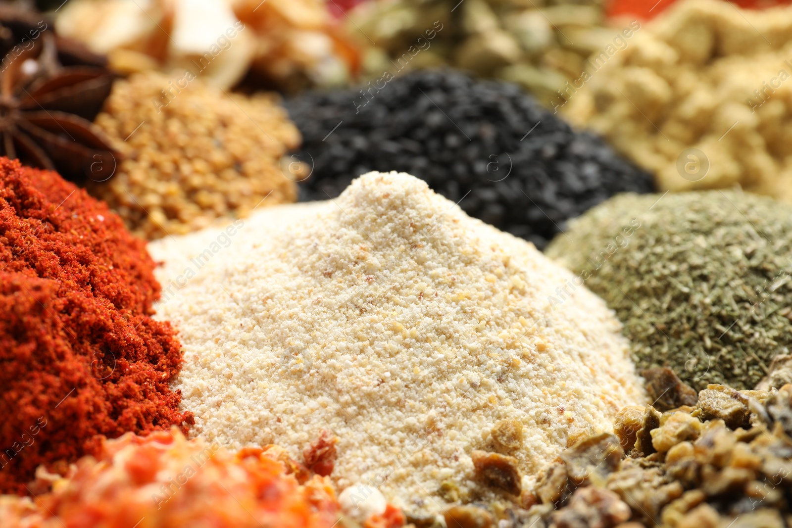 Many different spices as background, closeup view Photo of Many different spices as background, closeup view
