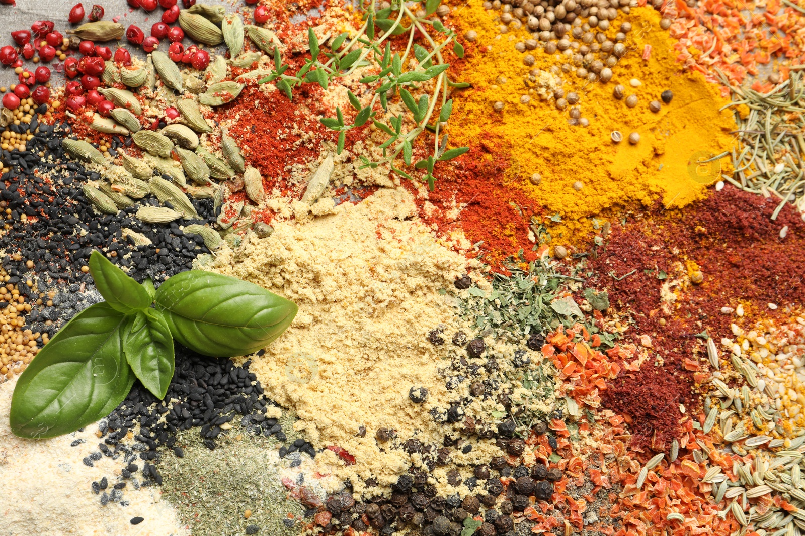 Many different spices on table, above view Photo of Many different spices on table, above view