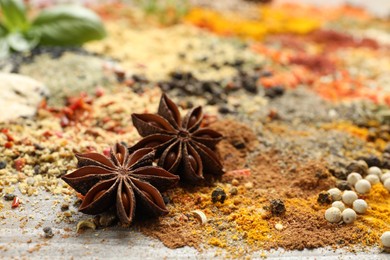 Photo of Many different spices on table, closeup view