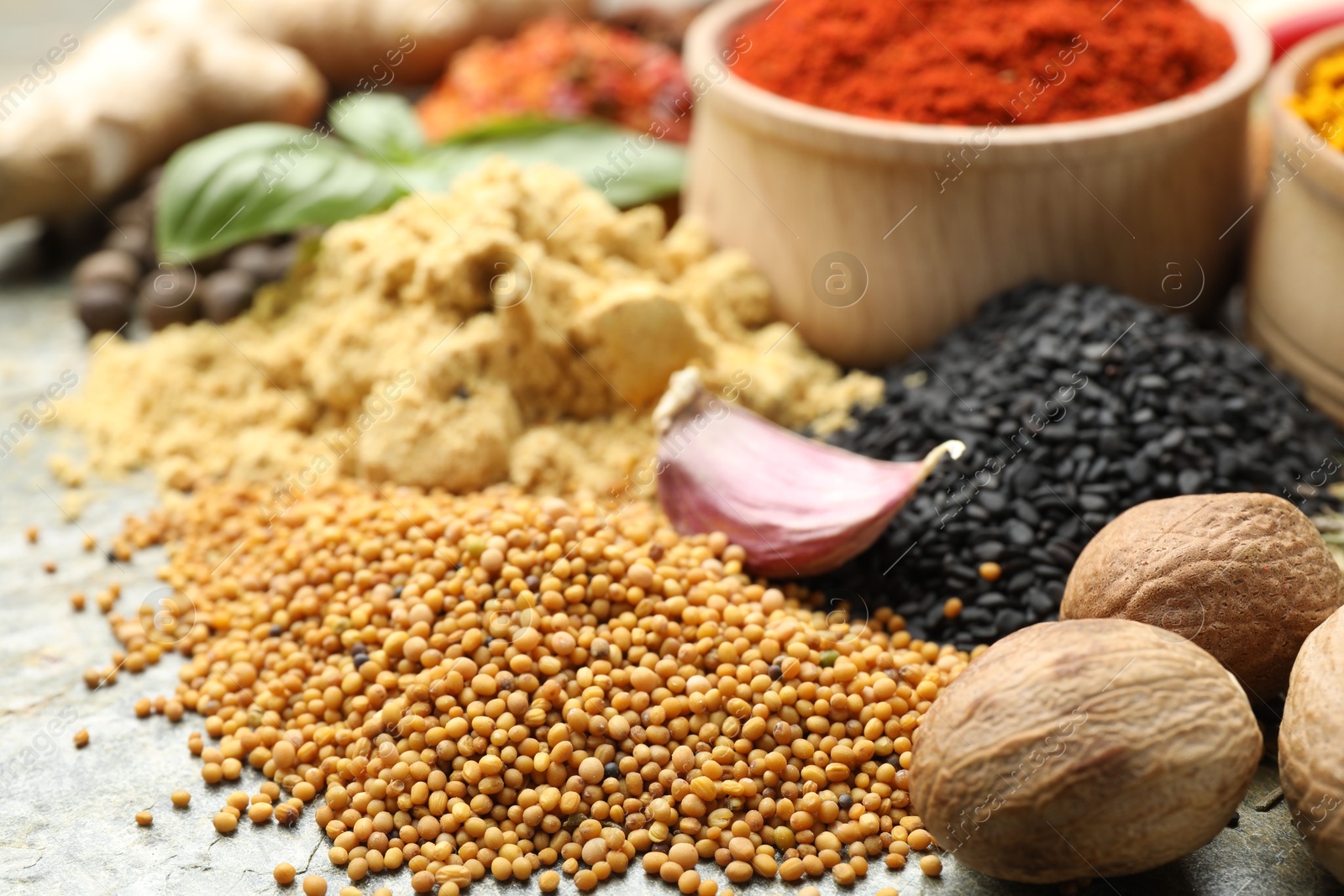 Many different spices on table, closeup view Photo of Many different spices on table, closeup view