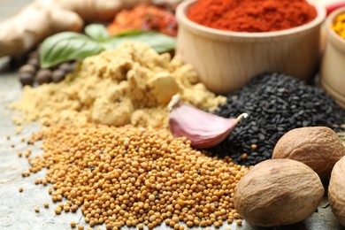 Photo of Many different spices on table, closeup view