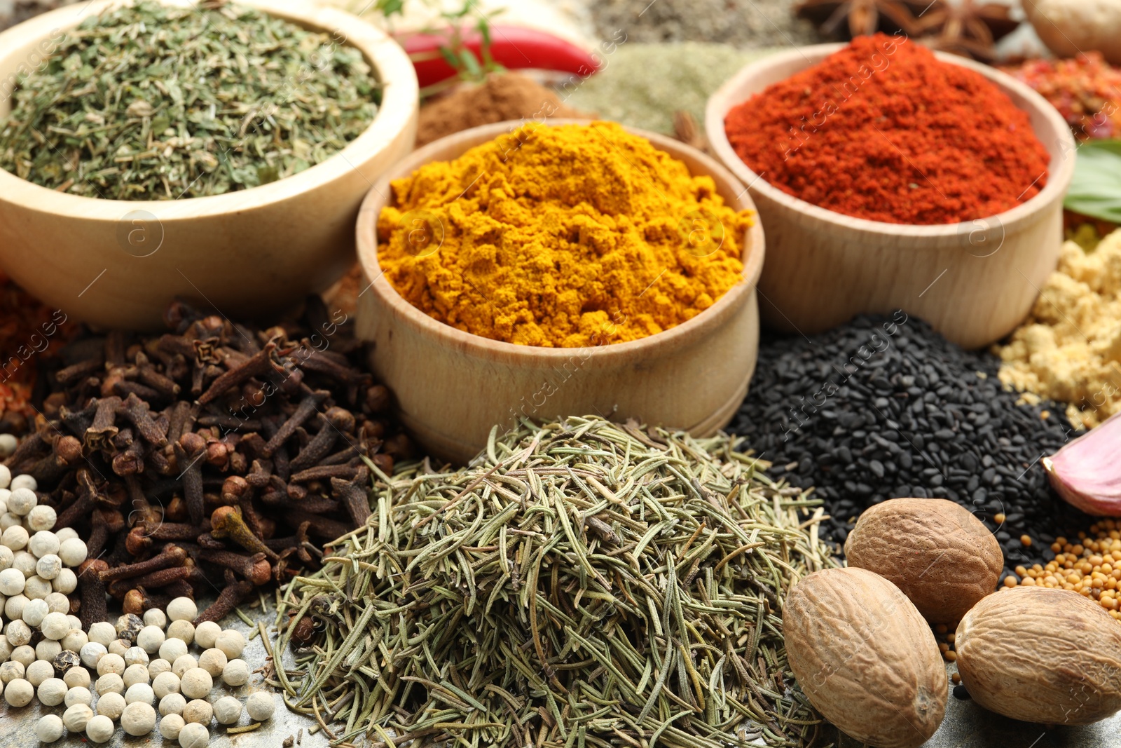 Many different spices on table, closeup view Photo of Many different spices on table, closeup view