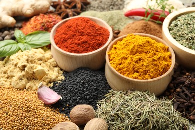 Photo of Many different spices on table, closeup view