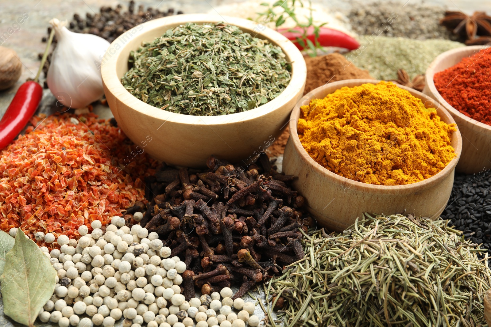 Many different spices on table, closeup view Photo of Many different spices on table, closeup view