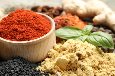 Photo of Many different spices on table, closeup view