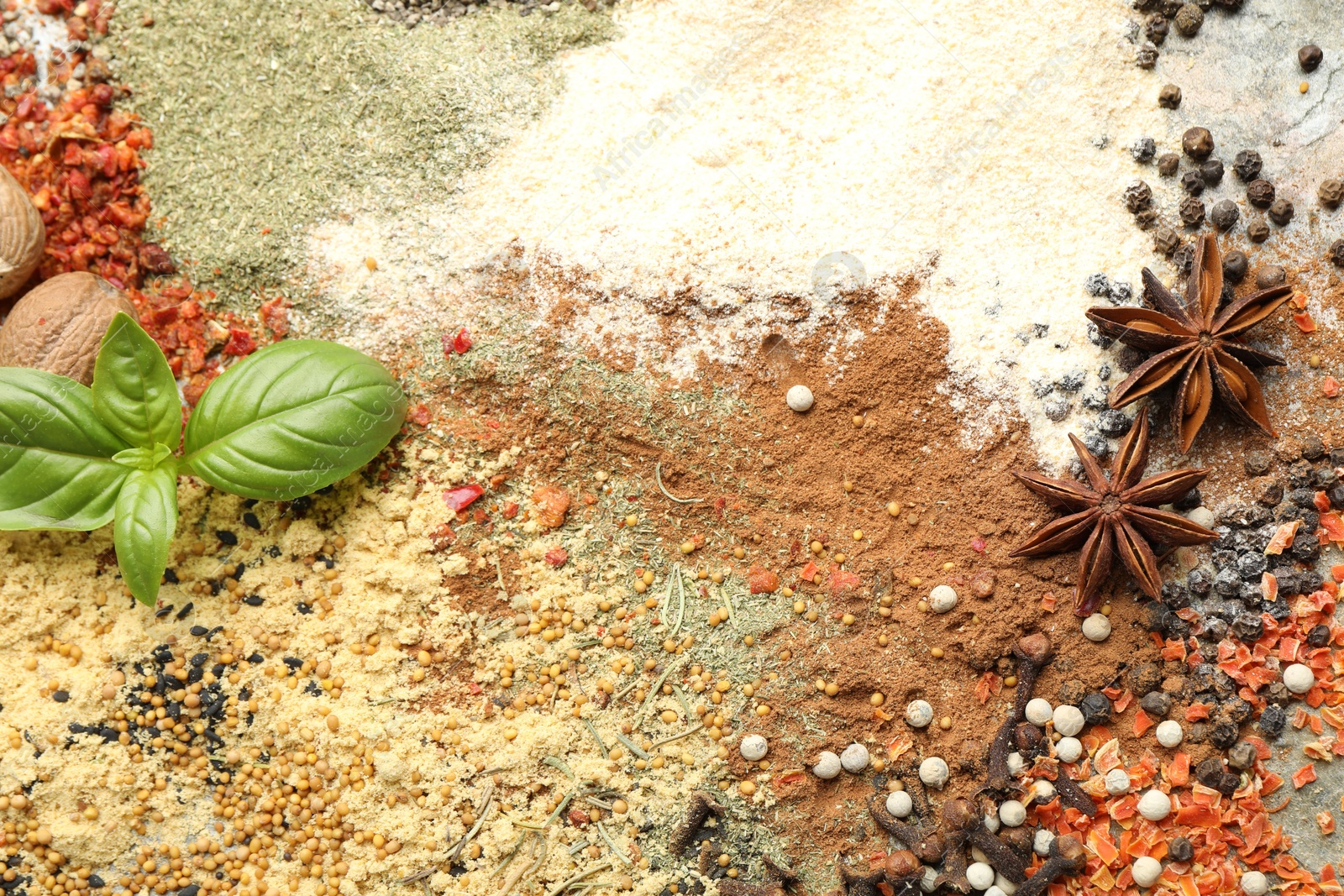 Many different spices as background, top view Photo of Many different spices as background, top view