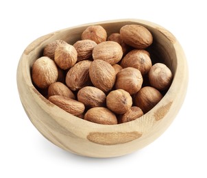 Photo of Fresh nutmegs in bowl isolated on white