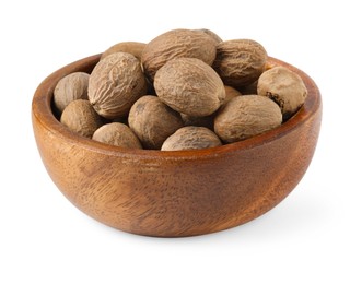 Photo of Fresh nutmegs in bowl isolated on white