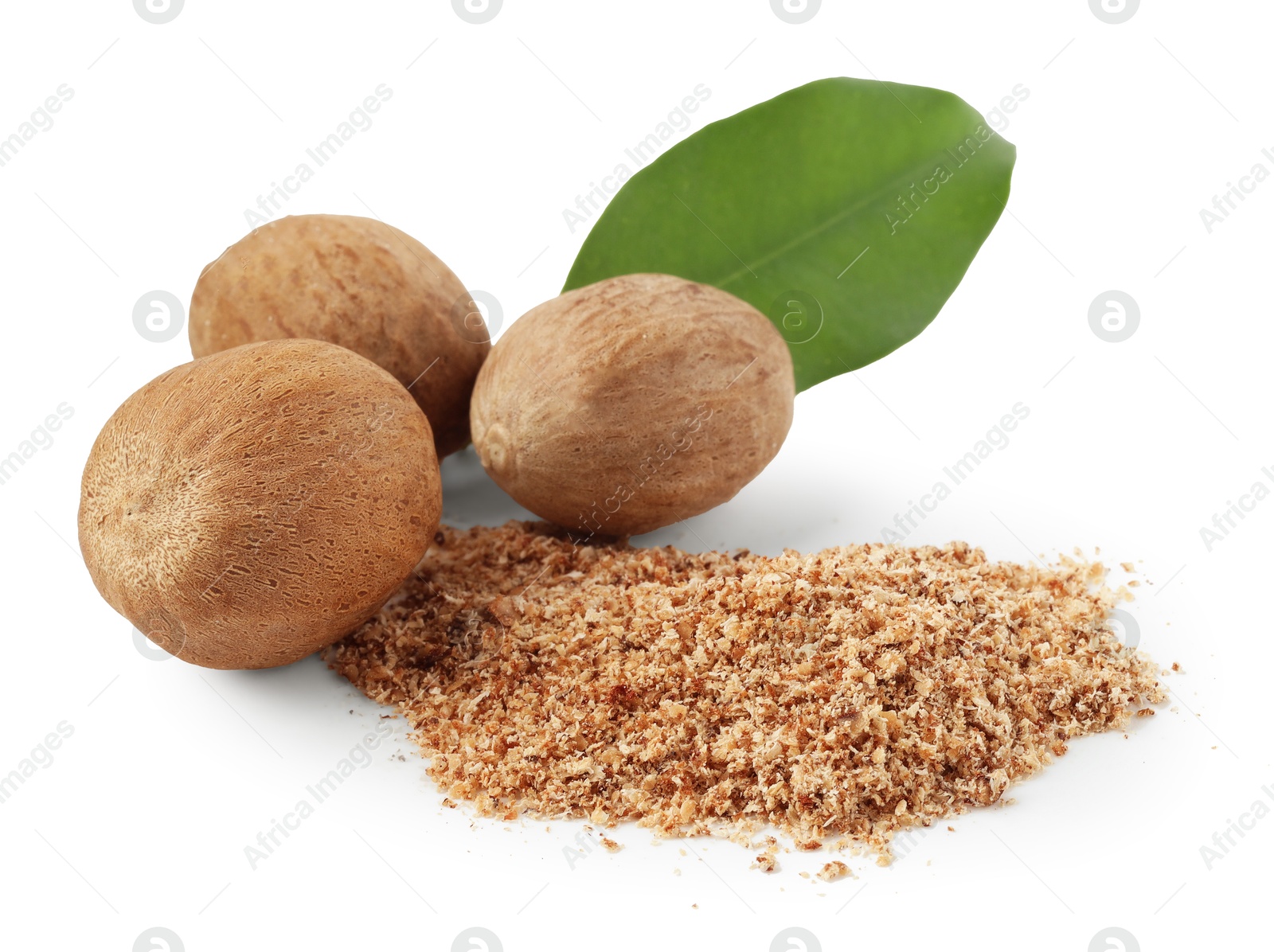 Whole nutmegs, powder and leaf isolated on white Photo of Whole nutmegs, powder and leaf isolated on white