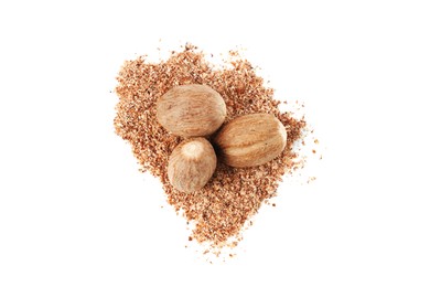 Photo of Whole nutmegs and powder isolated on white, top view