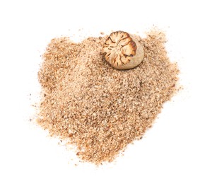 Photo of Half of nutmeg and powder isolated on white