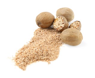 Photo of Whole, cut nutmegs and powder isolated on white