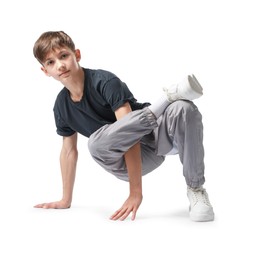Photo of Boy in stylish clothes dancing on white background