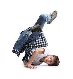 Photo of Boy in stylish clothes dancing on white background