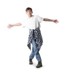 Photo of Boy in stylish clothes dancing on white background