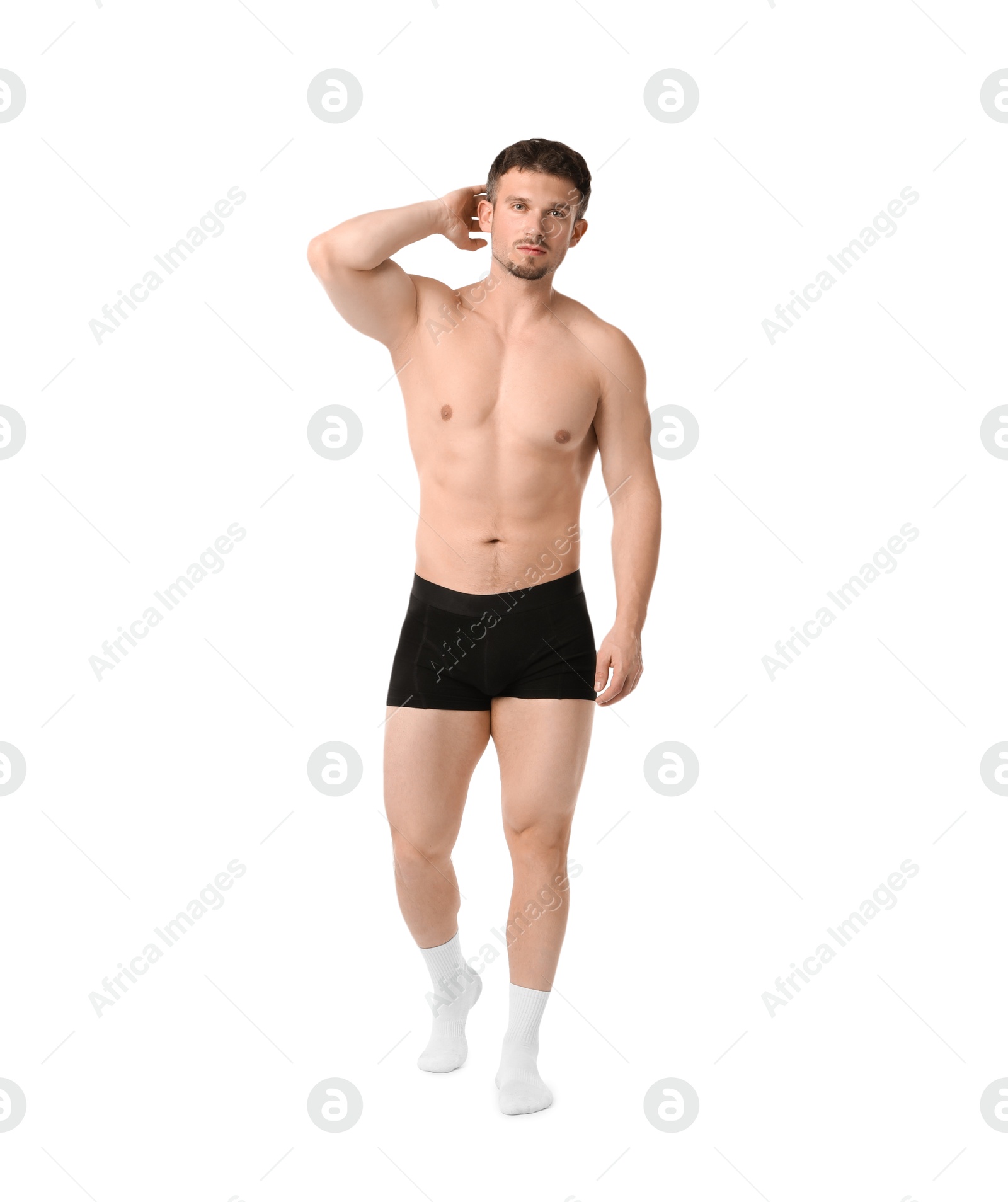 Young man in stylish black underwear on white background Photo of Young man in stylish black underwear on white background