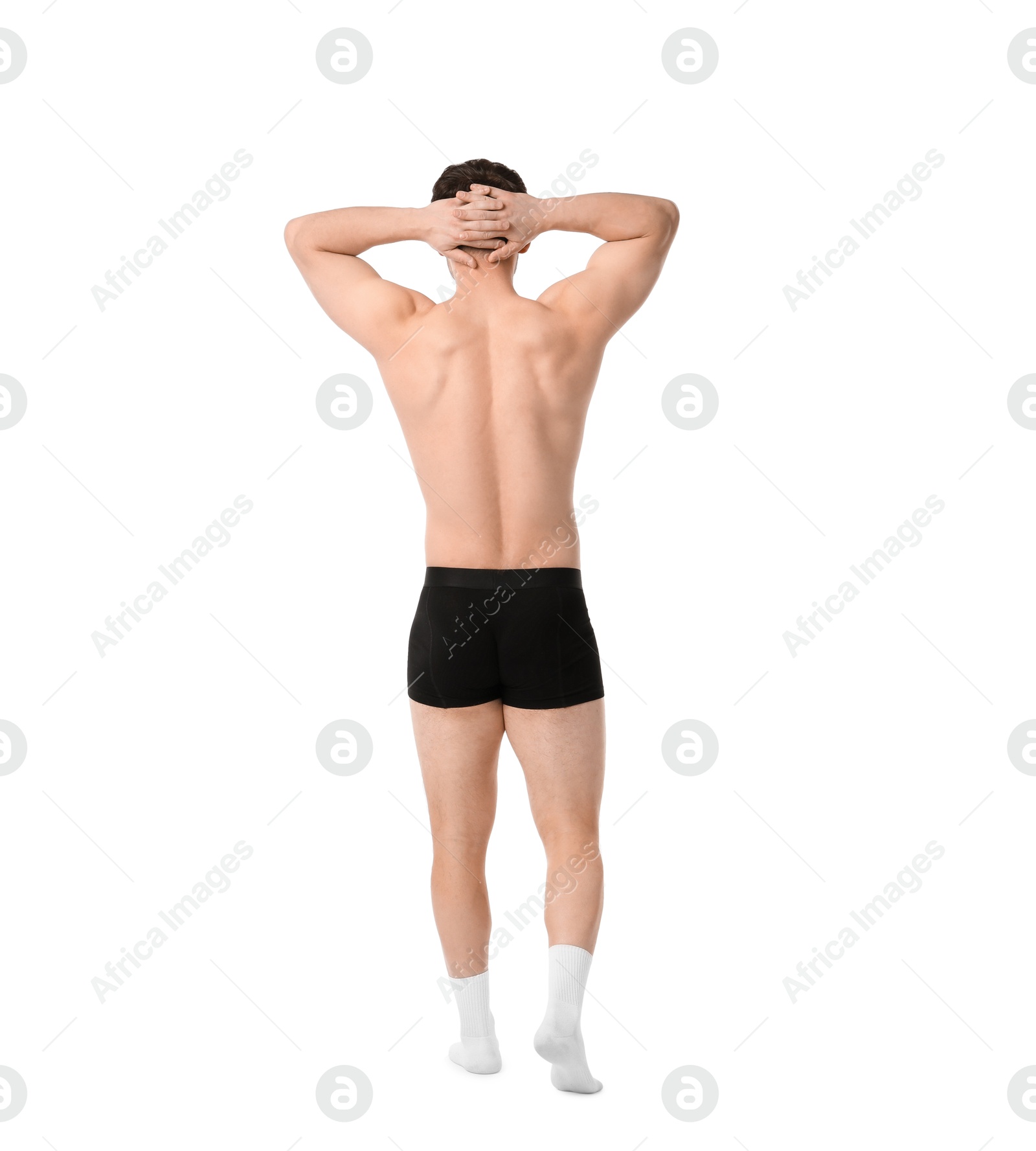 Young man in stylish black underwear on white background, back view Photo of Young man in stylish black underwear on white background, back view