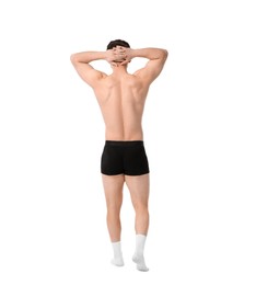 Photo of Young man in stylish black underwear on white background, back view