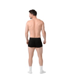 Photo of Young man in stylish black underwear on white background, back view