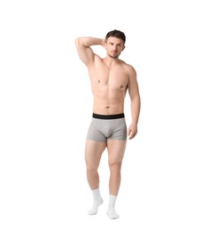 Photo of Young man in stylish light grey underwear on white background