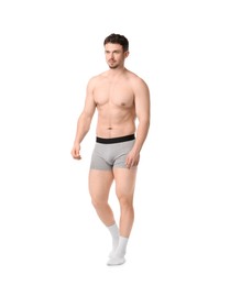 Photo of Young man in stylish light grey underwear on white background