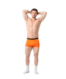 Photo of Young man in stylish orange underwear on white background