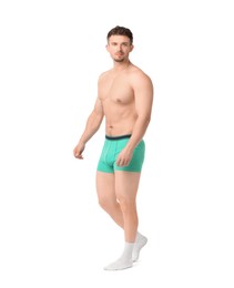 Photo of Young man in stylish turquoise underwear on white background