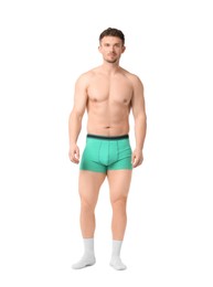 Photo of Young man in stylish turquoise underwear on white background