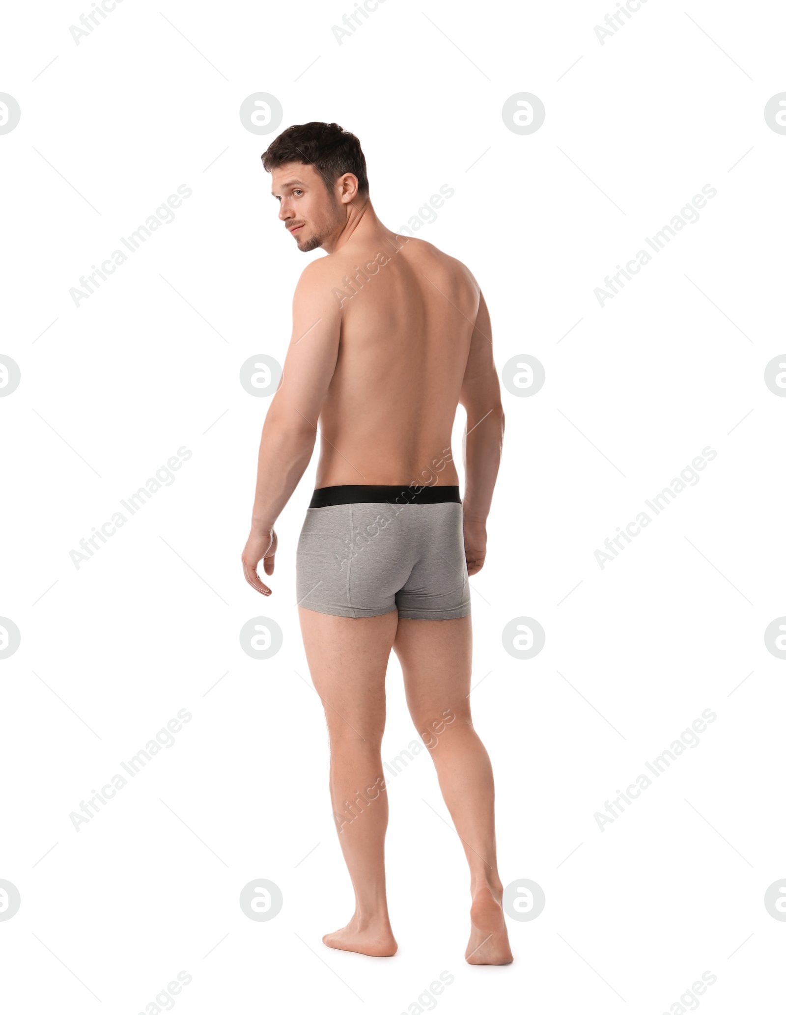 Young man in stylish light grey underwear on white background, back view Photo of Young man in stylish light grey underwear on white background, back view