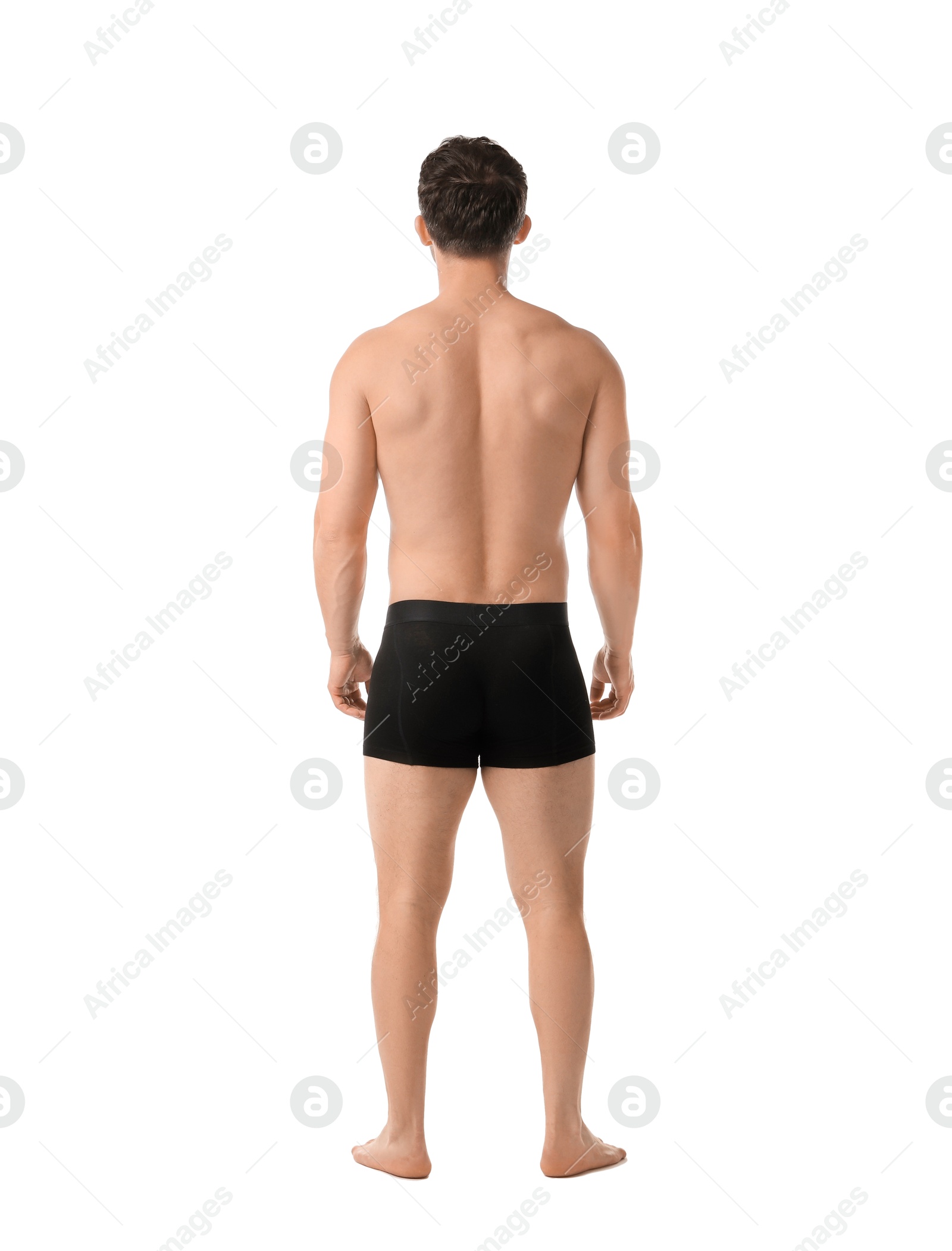 Young man in stylish black underwear on white background, back view Photo of Young man in stylish black underwear on white background, back view