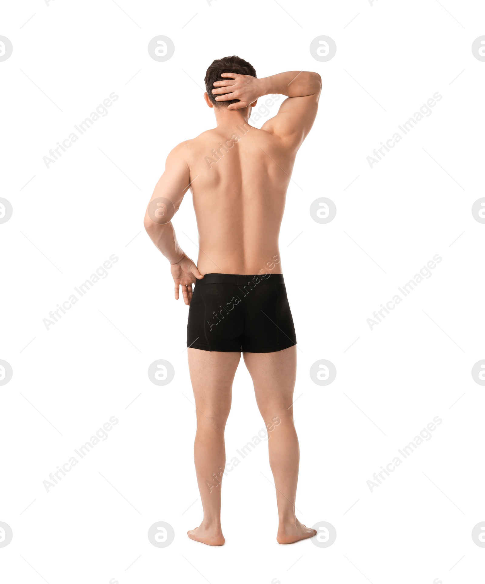 Young man in stylish black underwear on white background, back view Photo of Young man in stylish black underwear on white background, back view