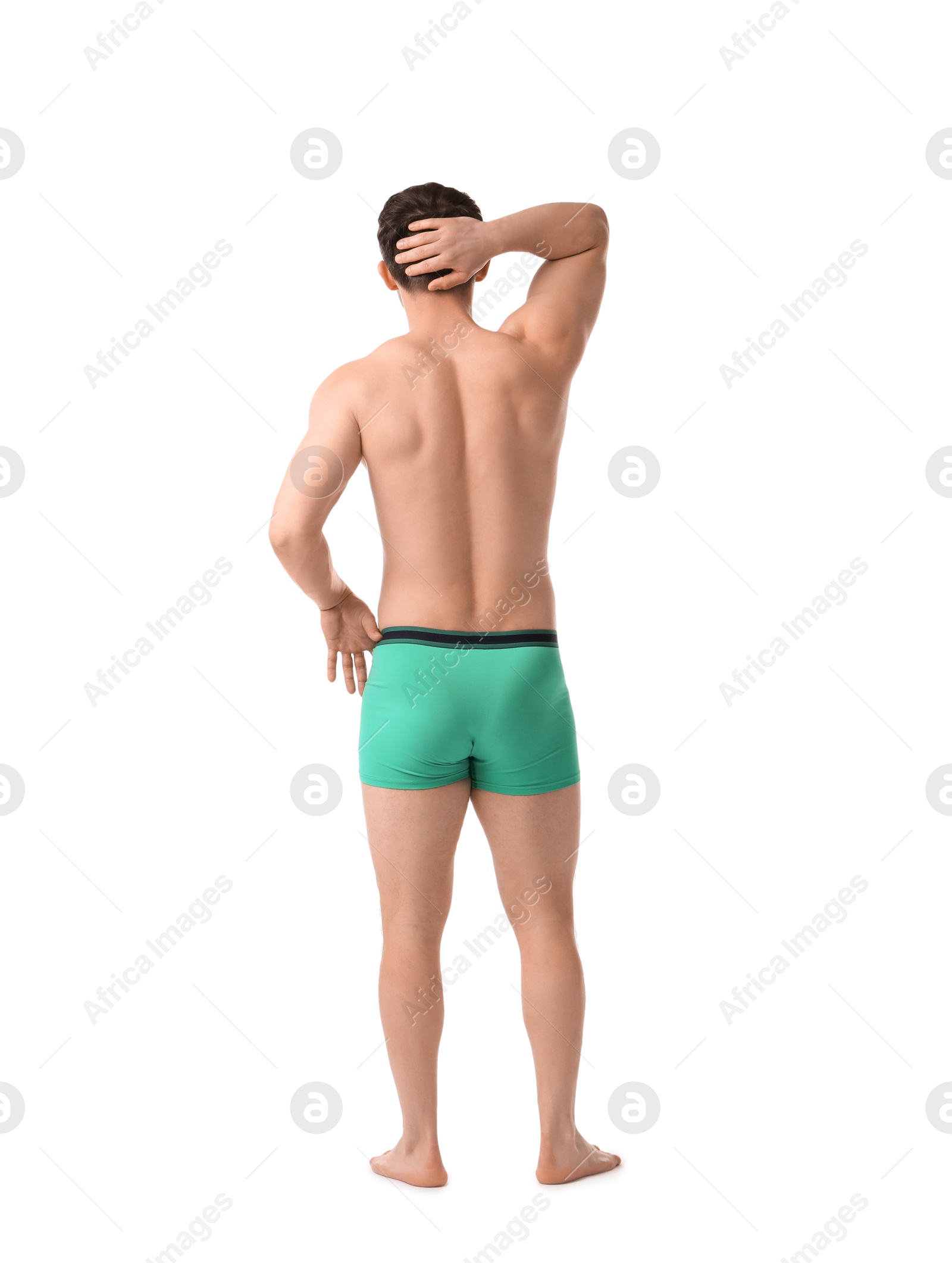 Young man in stylish turquoise underwear on white background, back view Photo of Young man in stylish turquoise underwear on white background, back view