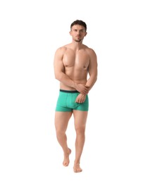 Photo of Young man in stylish turquoise underwear on white background