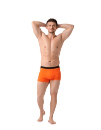 Photo of Young man in stylish orange underwear on white background