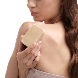 Photo of Woman with soap bar on white background, closeup