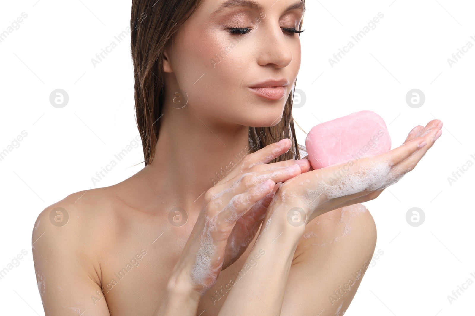 Woman with foaming soap bar on white background, closeup Photo of Woman with foaming soap bar on white background, closeup