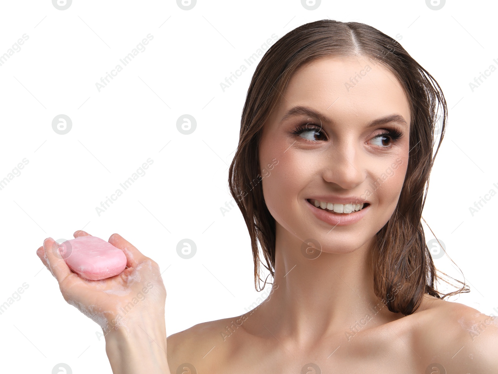 Smiling woman with foaming soap bar on white background, closeup Photo of Smiling woman with foaming soap bar on white background, closeup