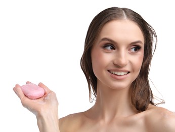 Photo of Smiling woman with foaming soap bar on white background, closeup
