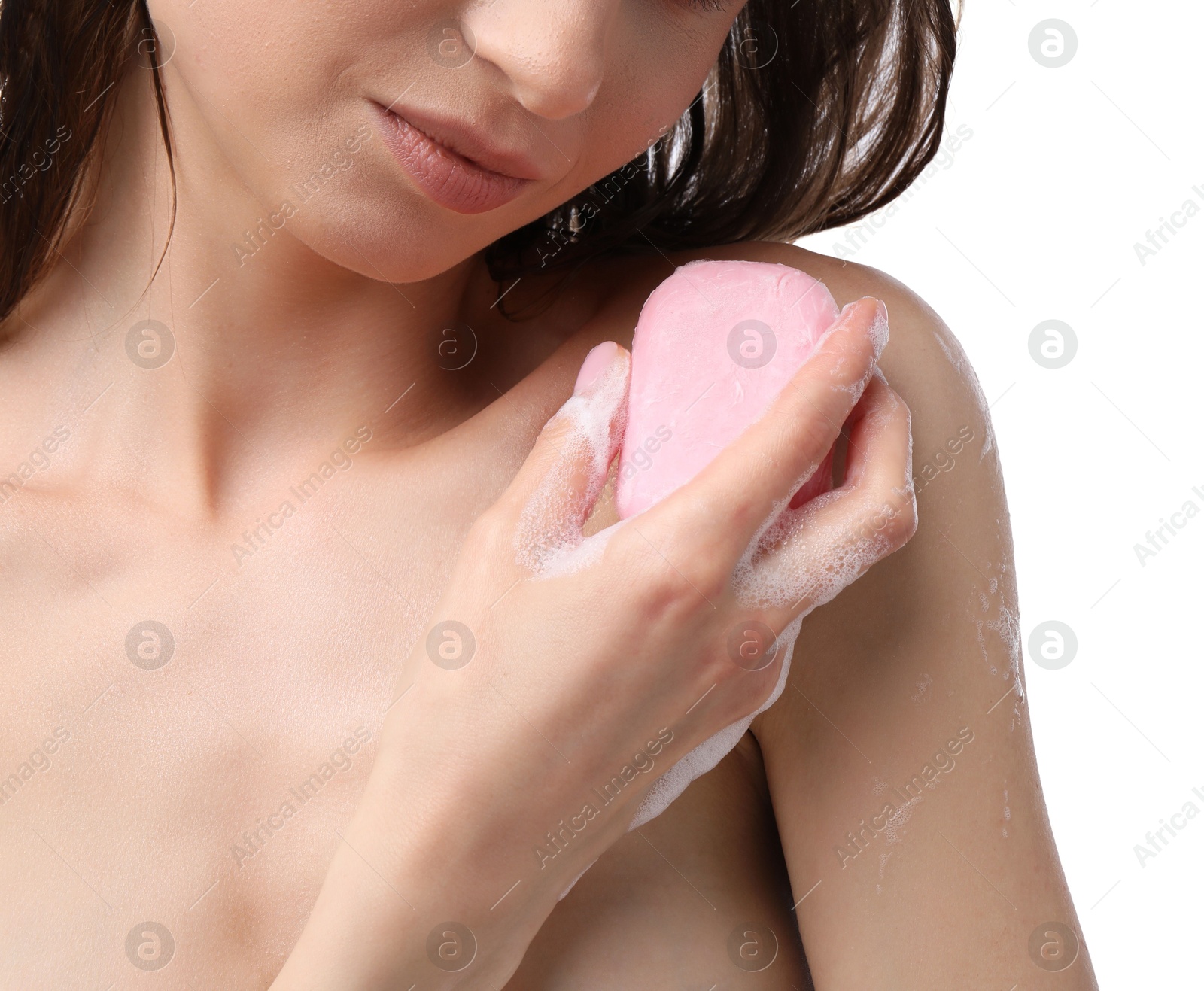 Woman washing body with soap bar on white background, closeup Photo of Woman washing body with soap bar on white background, closeup