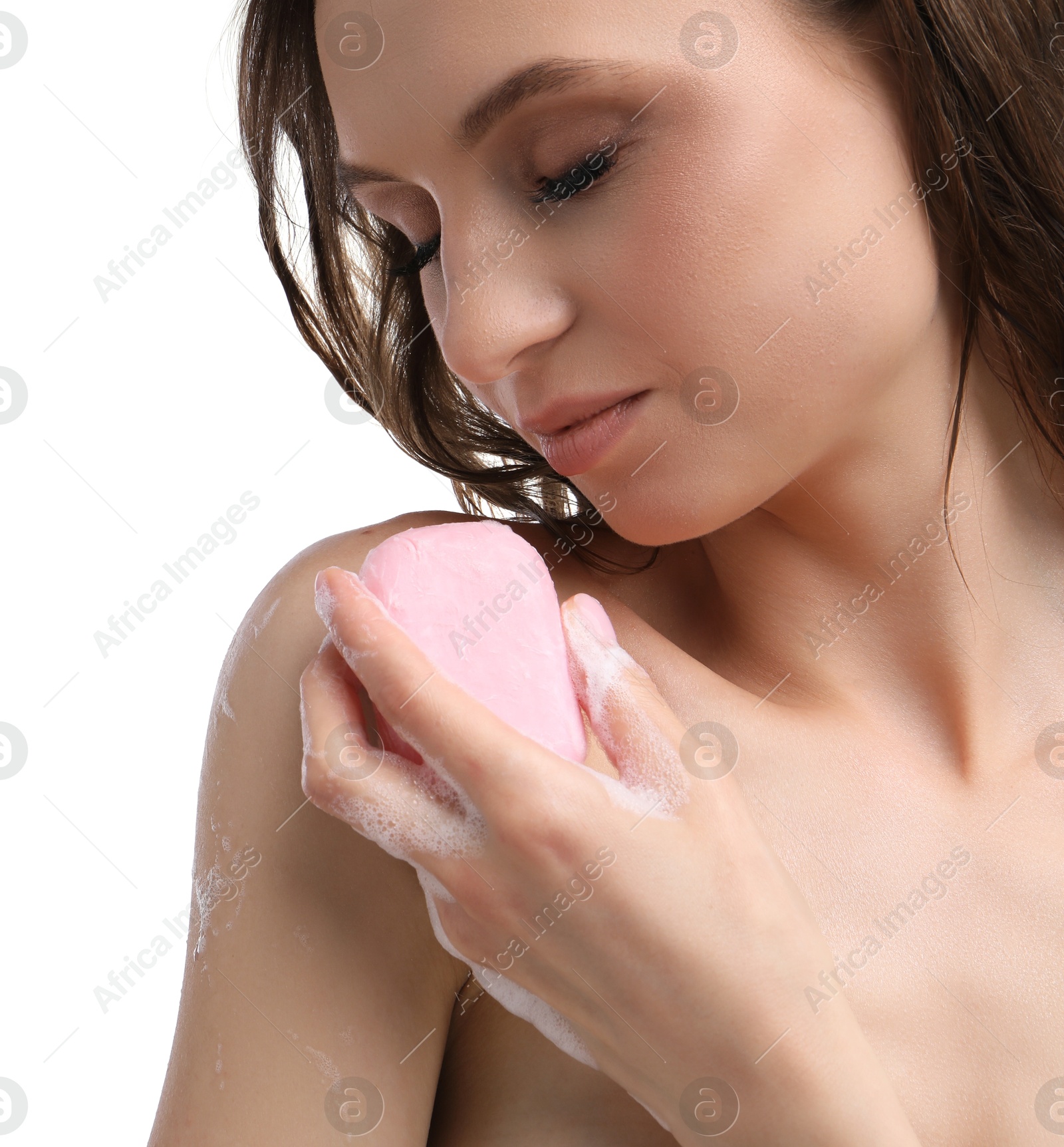 Woman washing body with soap bar on white background, closeup Photo of Woman washing body with soap bar on white background, closeup